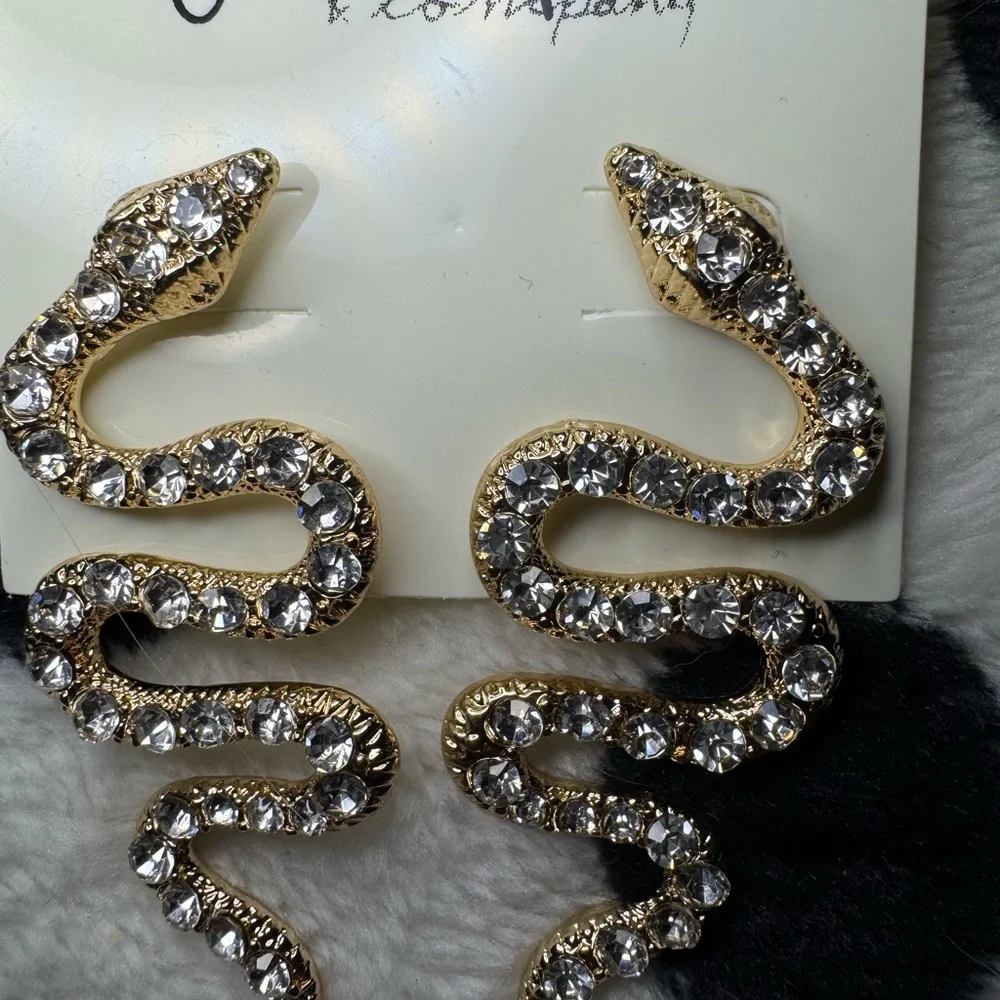 Jennifer & Company Gold Serpentine Earrings with Textured Design